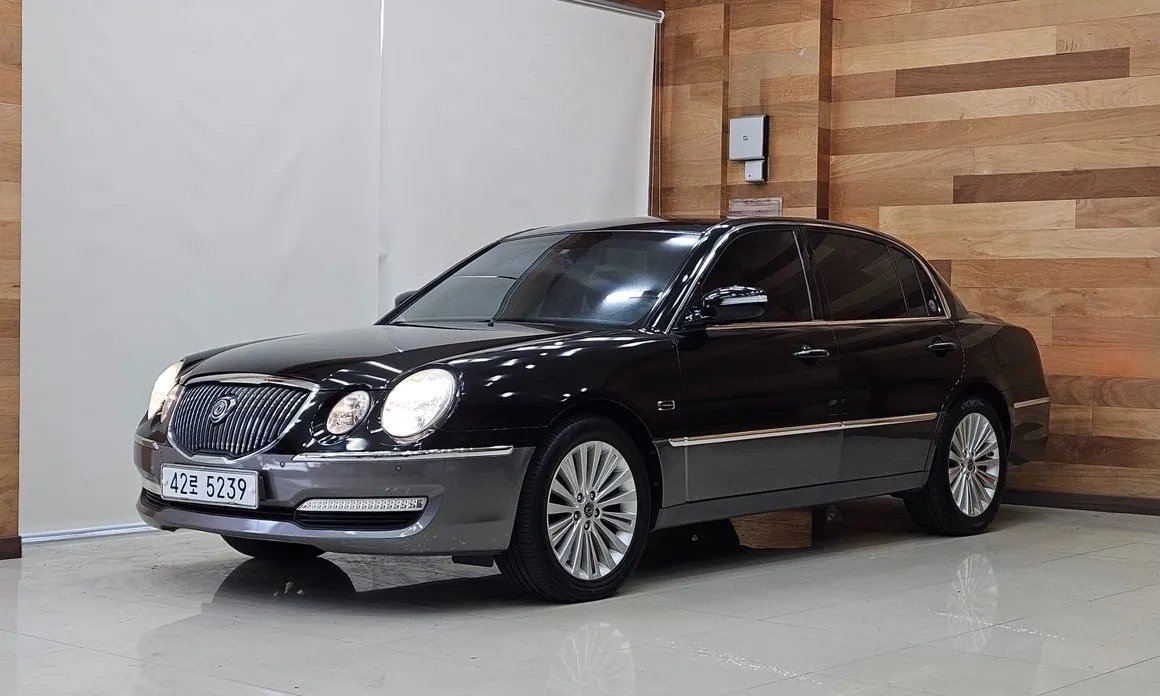 Kia OPIRUS 2010 — фото 1 из 5