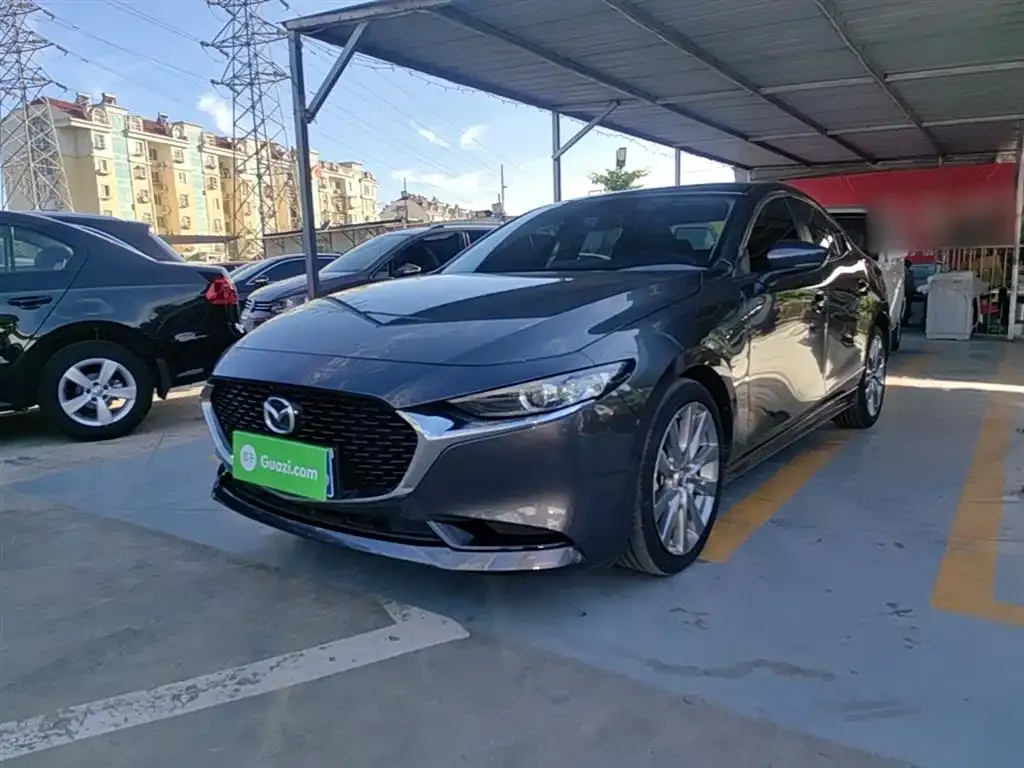 Mazda 3 Axela 2023 — фото 1 из 25