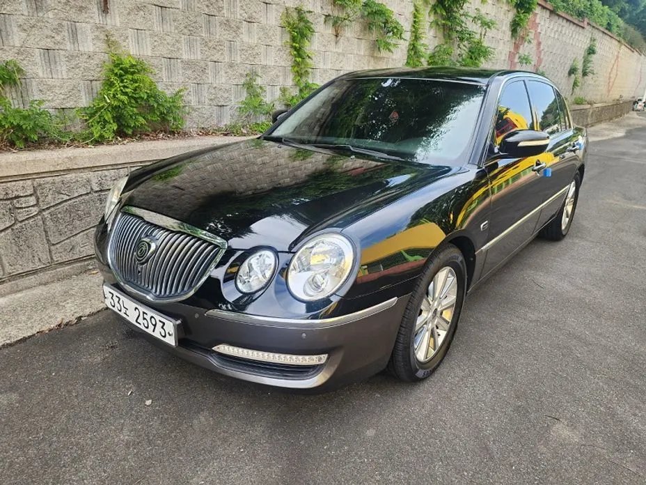Kia OPIRUS 2010 — фото 1 из 5