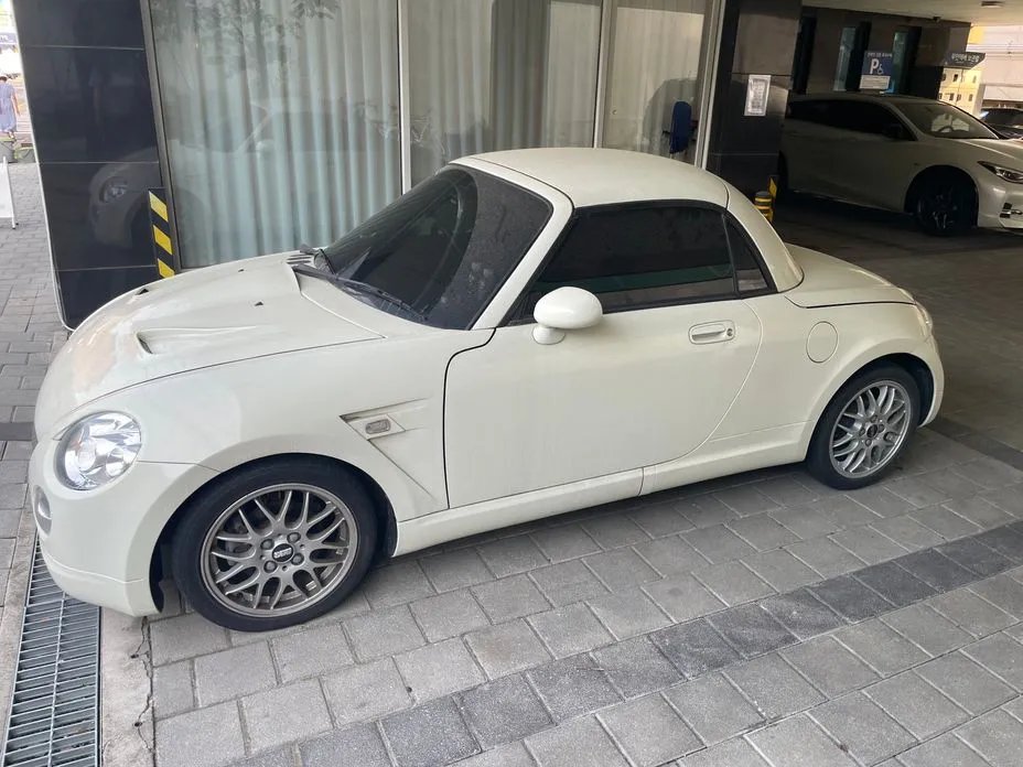 Daihatsu Copen 2009 — фото 1 из 5