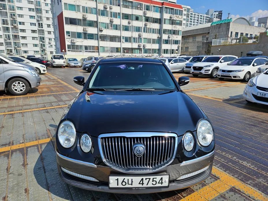 Kia OPIRUS 2010 — фото 1 из 5