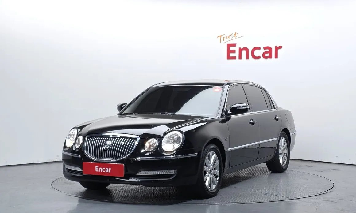 Kia OPIRUS 2010 — фото 1 из 5
