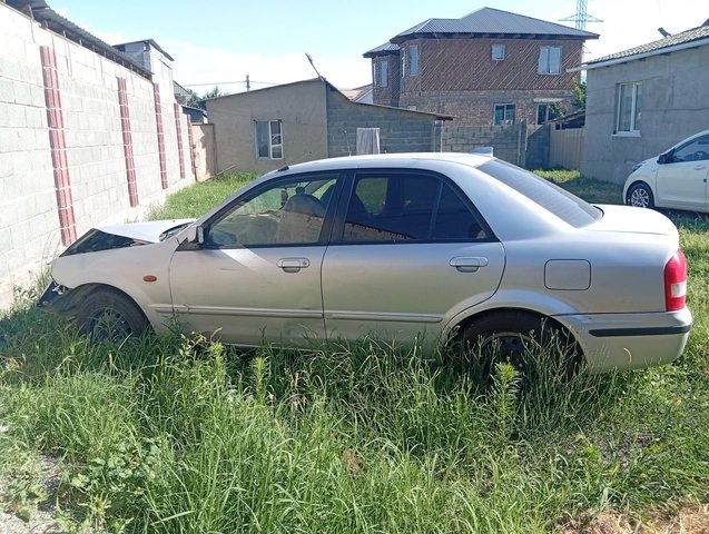 Mazda 323 VI (BJ) Рестайлинг 2001