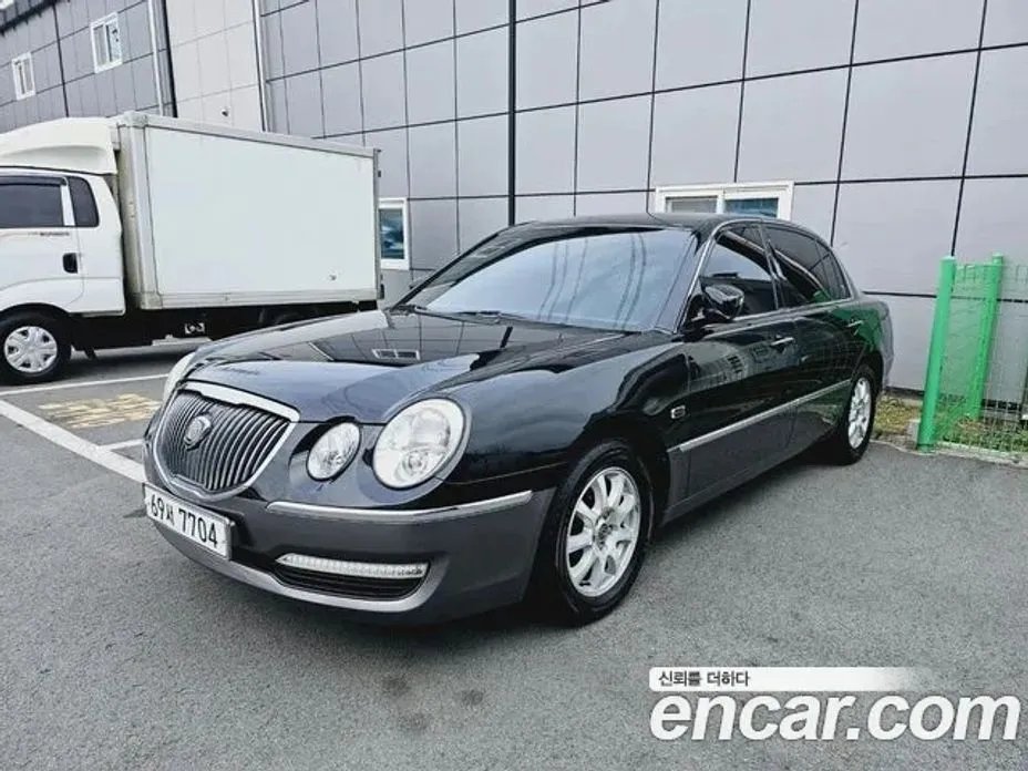 Kia OPIRUS 2010 — фото 1 из 5