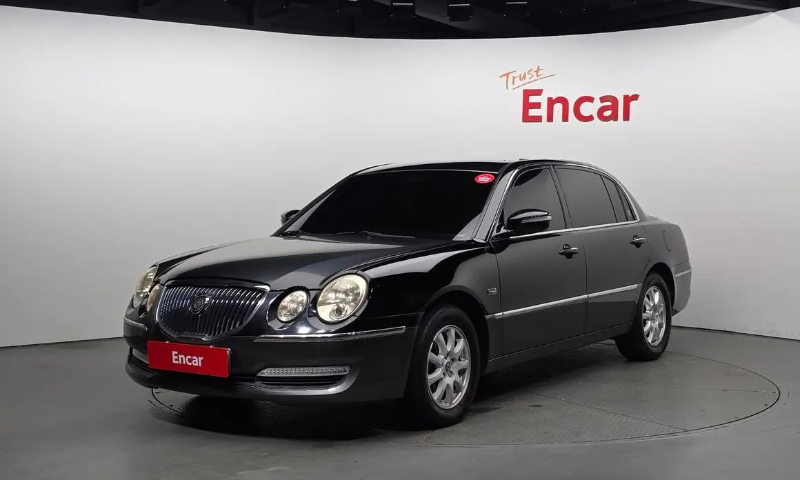 Kia OPIRUS 2010 — фото 1 из 5