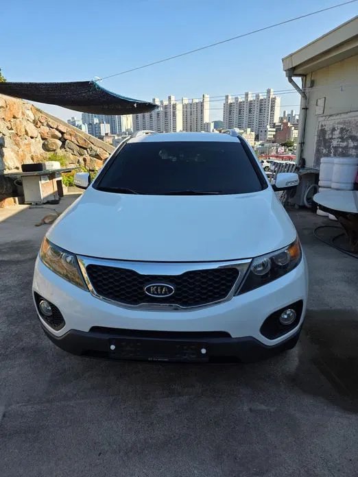 Kia Sorento 2011 — фото 1 из 5