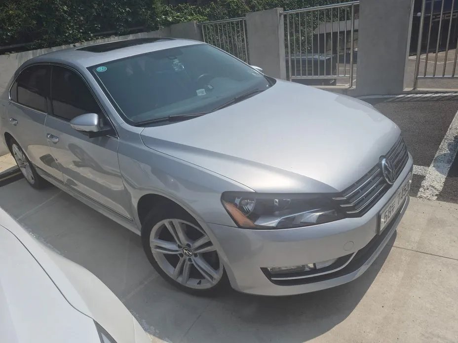 Volkswagen Passat 2012 — фото 1 из 4