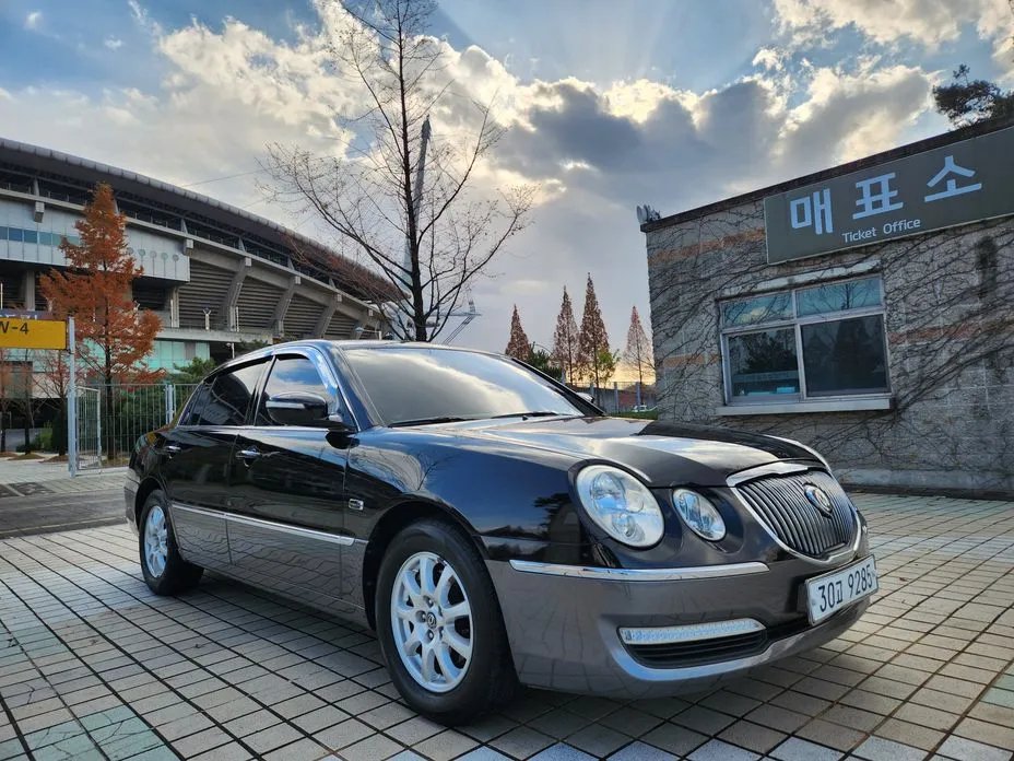 Kia OPIRUS 2010 — фото 1 из 5